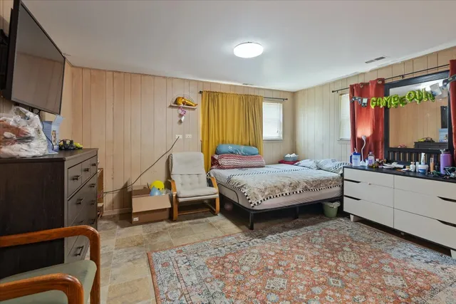 a view of a car parked in front of a house