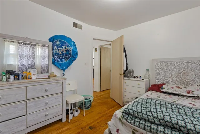 a view of a house with a yard and a garden