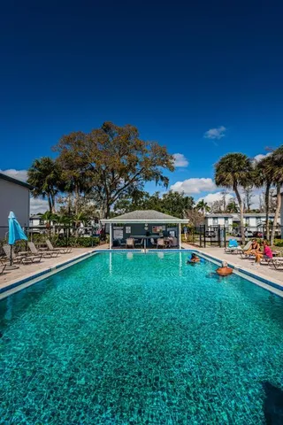 a view of an house with outdoor space and seating area