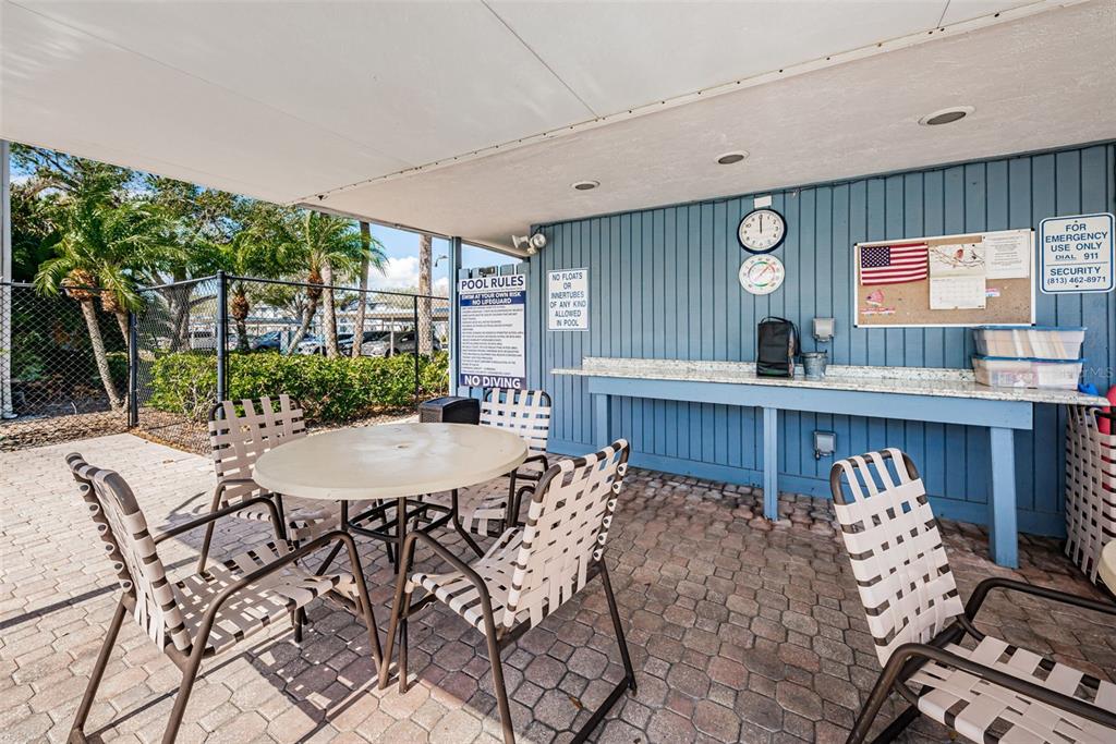 146 Cypress Lane Oldsmar, FL 34677 - Photo 36 of 44 a view of a dining room with furniture and window