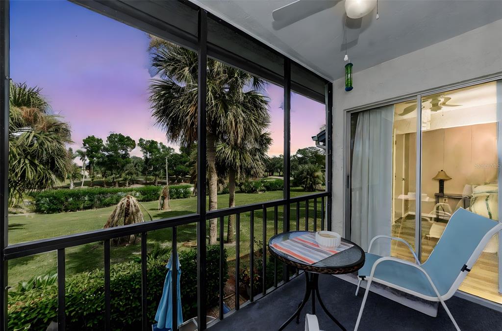 146 Cypress Lane Oldsmar, FL 34677 - Photo 5 of 44 a view of a balcony with furniture