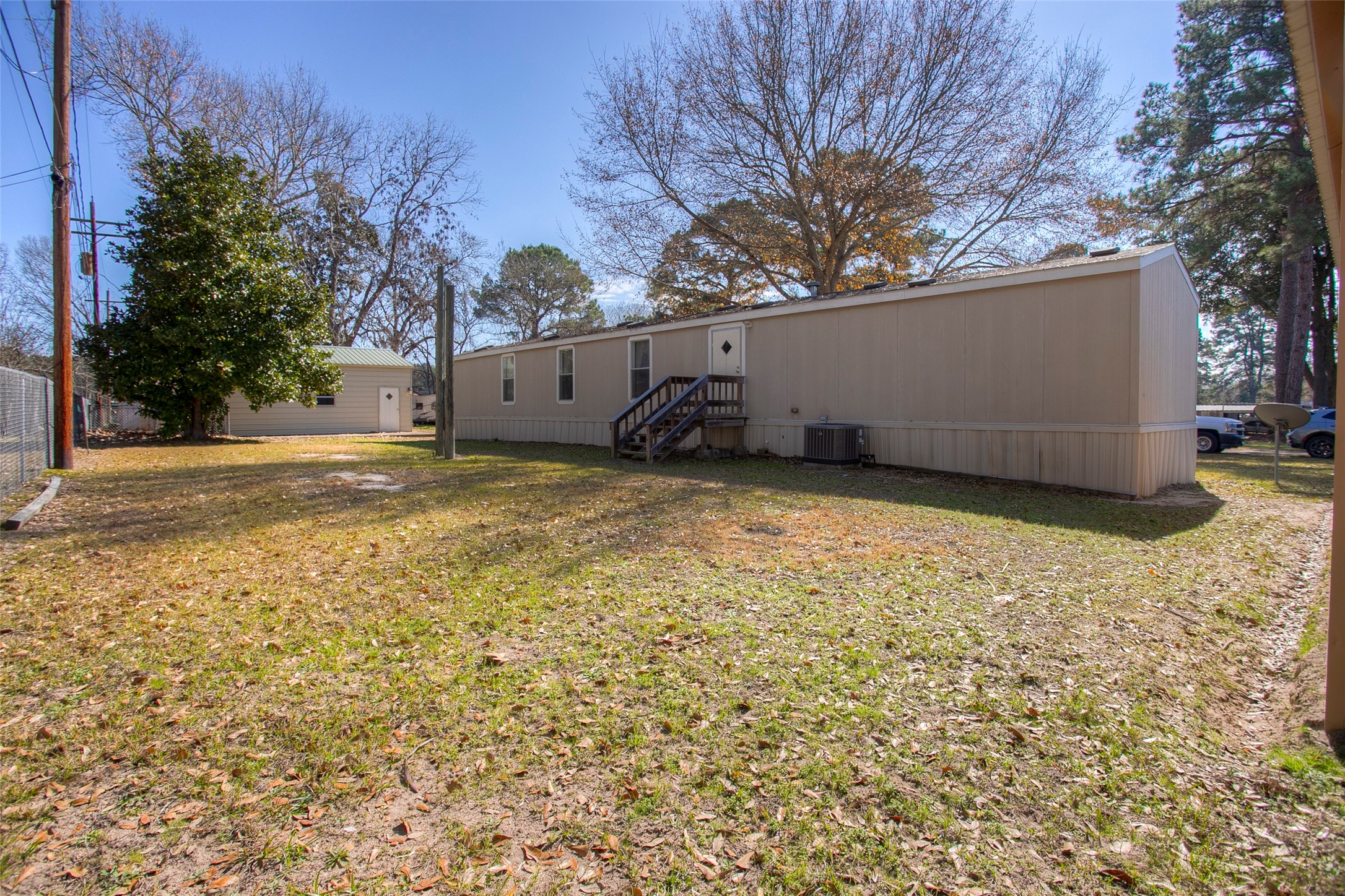 179 Mercury Trinity, TX 75862 - Photo 38 of 47 Spacious backyard with room to roam, plus a rear entry for easy access.