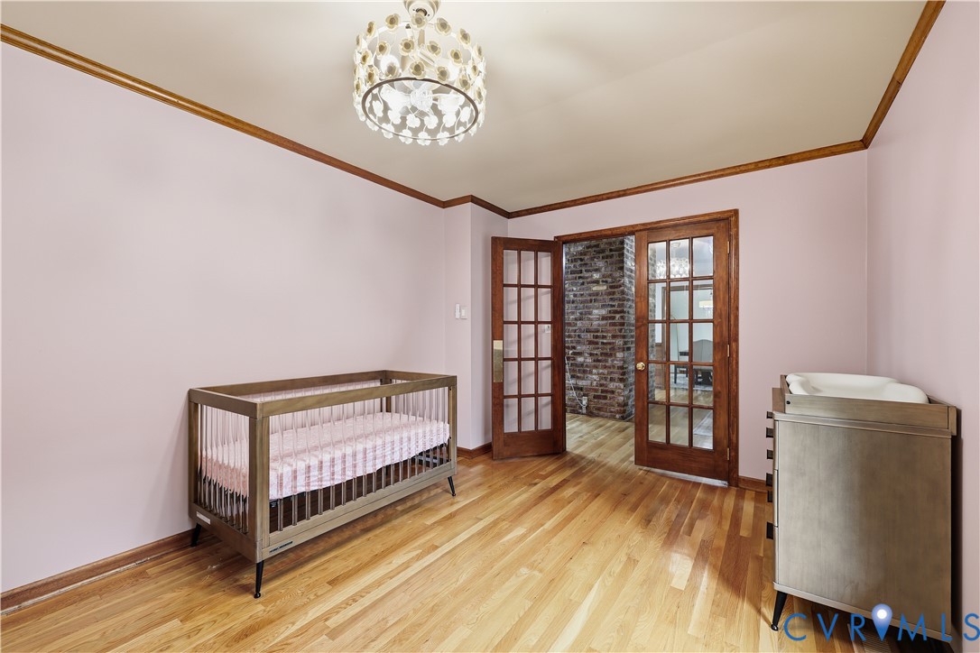 8100 Gold Acres Farm Road Prince George, VA 23875 - Photo 29 of 50 Bedroom with ornamental molding, light wood finish