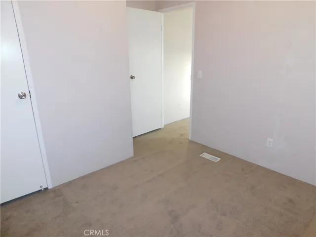 a white toilet sitting next to a bath tub shower