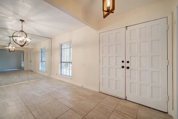 a view of a bathroom with a shower and a sink