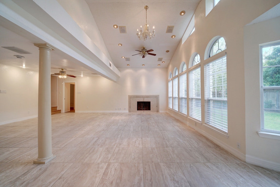 10509 Doering Lane Austin, TX 78750 - Photo 36 of 36 a view of an empty room with a fireplace and a window