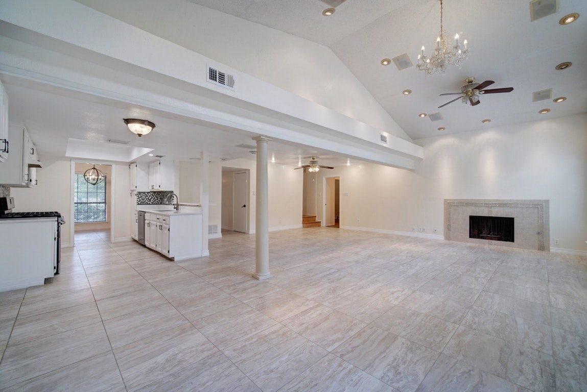10509 Doering Lane Austin, TX 78750 - Photo 5 of 36 a view of a kitchen with furniture and a fireplace