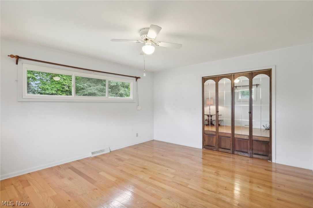 3873 Baumberger Road Stow, OH 44224 - Photo 16 of 50 Spare room with ceiling fan and light hardwood / wood-style flooring