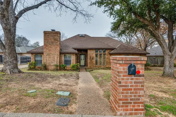a front view of a house with a porch