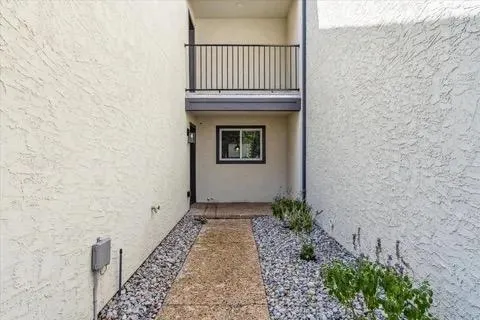 a view of a pathway from a door