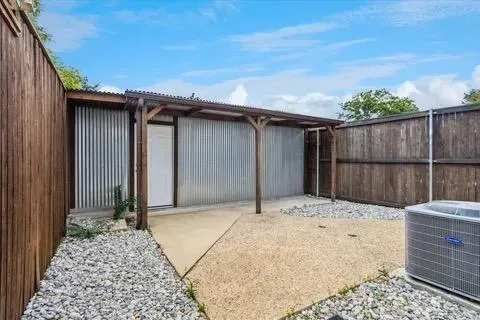 a view of a room with wooden walls