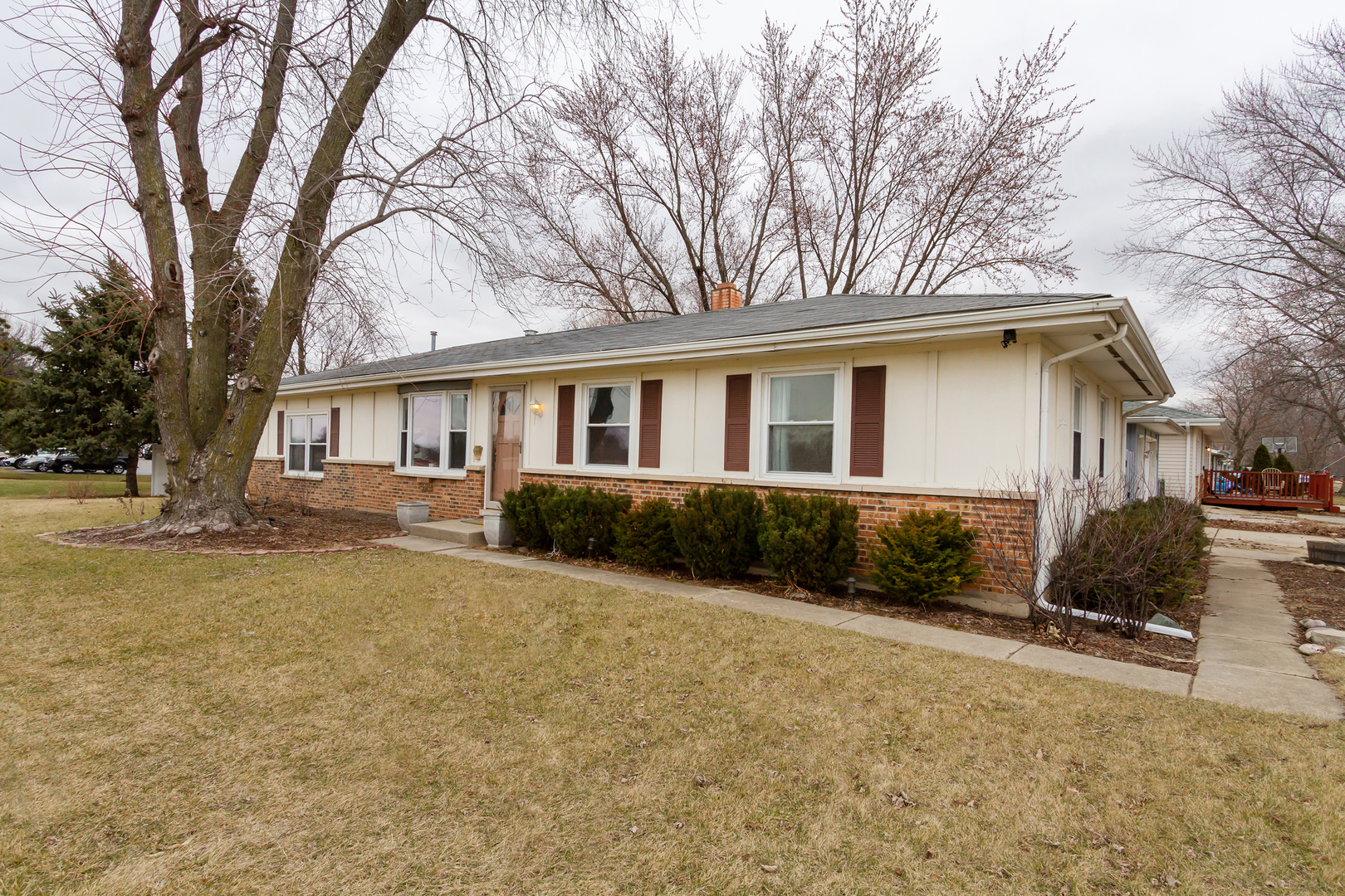 800 Orchard Road Montgomery, IL 60538 - Photo 2 of 21 a view of a house with a yard covered in snow