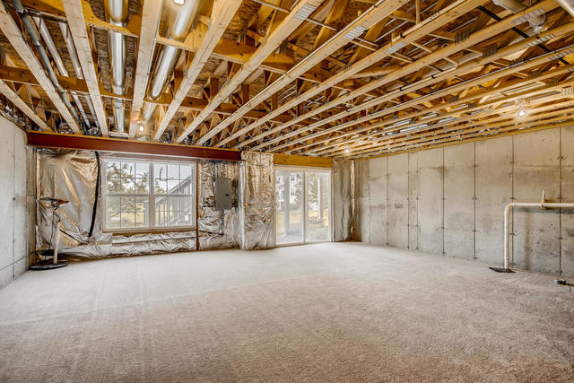 2891 Church Road Aurora, IL 60502 - Photo 22 of 28 a view of an empty room with a fireplace