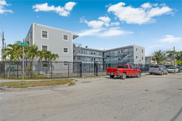 a view of parking with cars