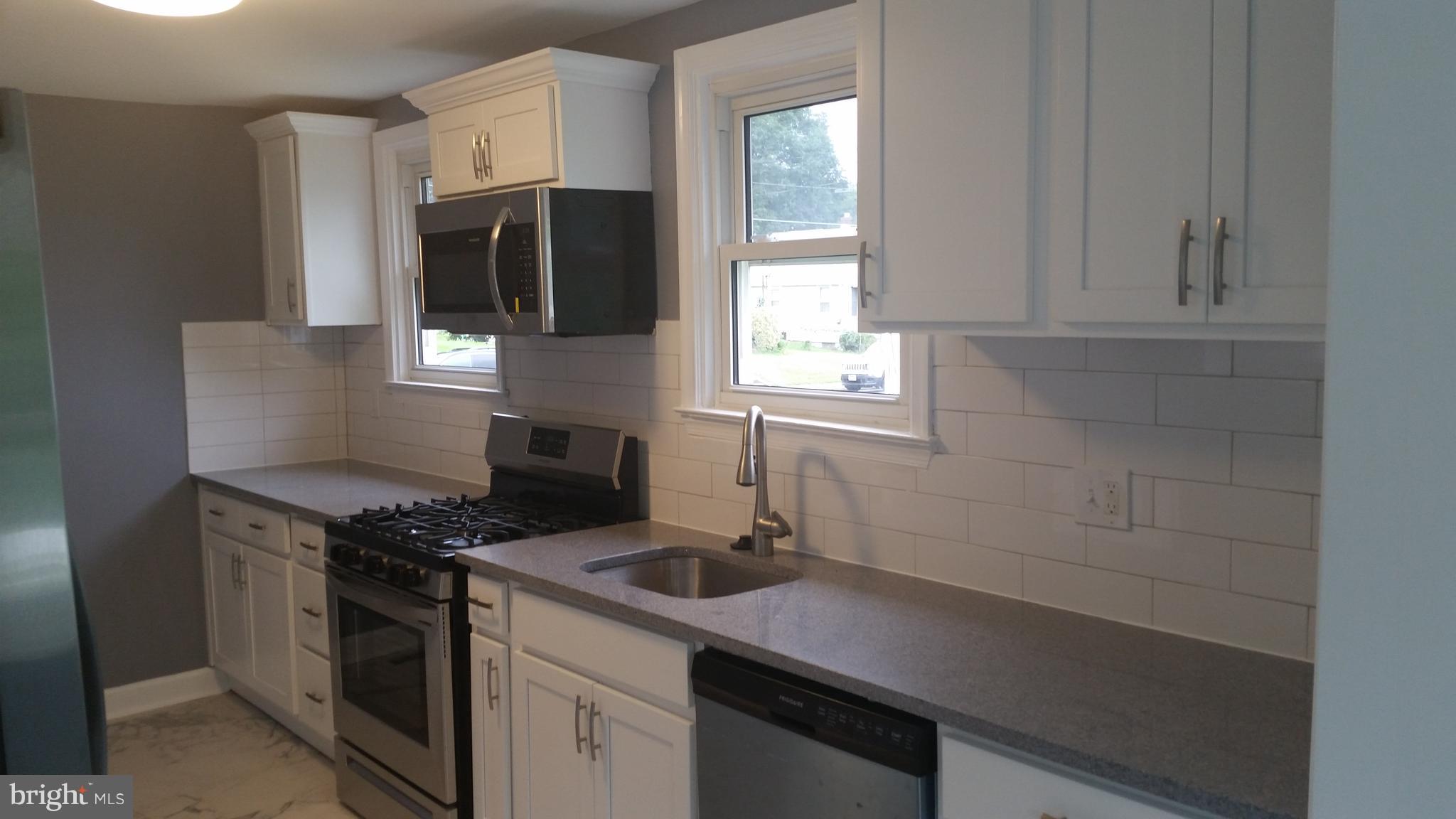 625 North Stuart Street Baltimore, MD 21221 - Photo 1 of 27 Kitchen
