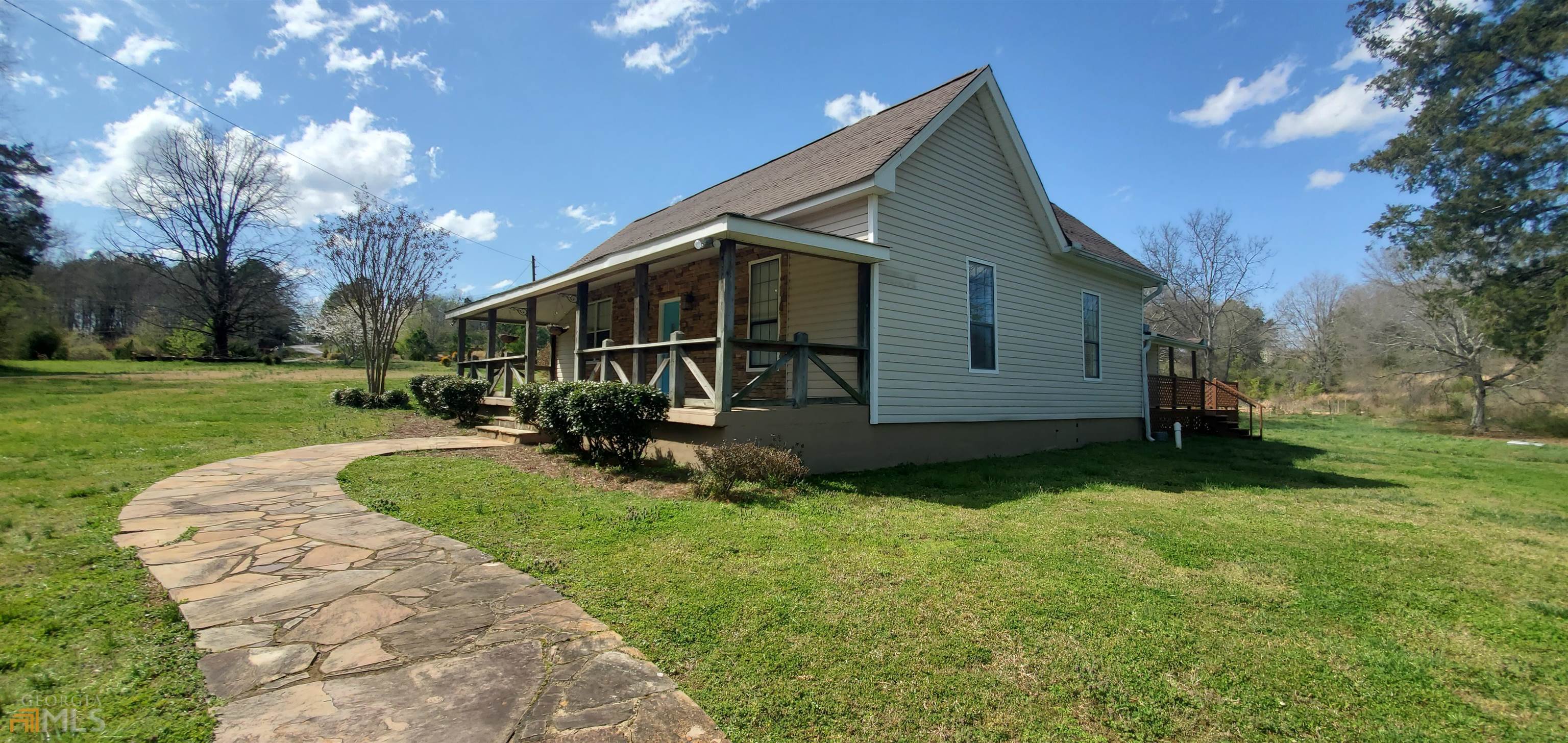 375 Brewer Road Kingston, GA 30145 - Photo 1 of 1 a view of a house with a yard