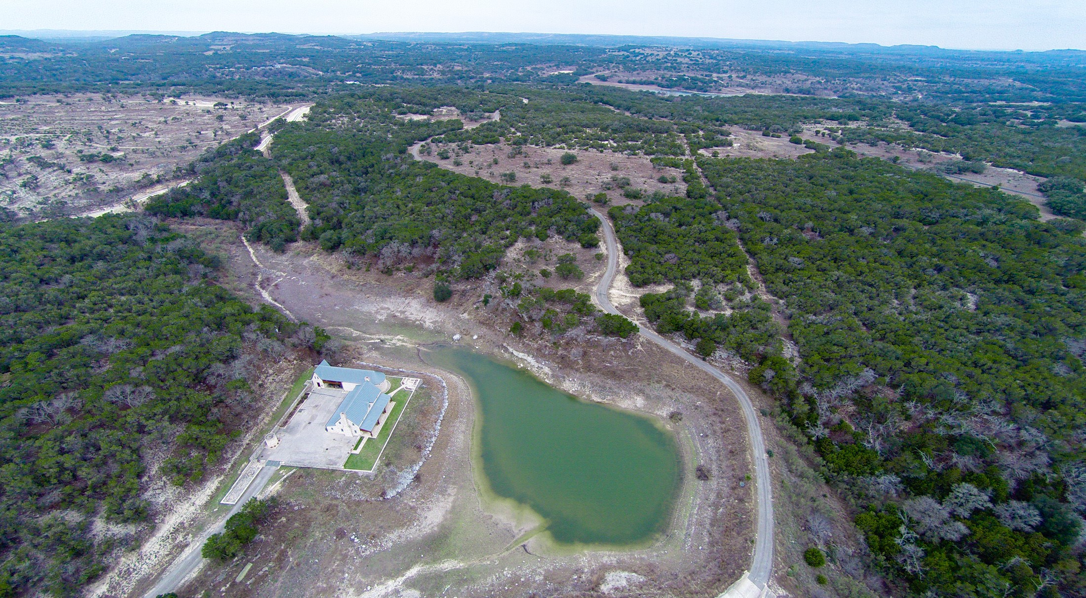 3777 Middle Creek Road Blanco, TX 78606 - Photo 31 of 40 an aerial view of a house with a yard