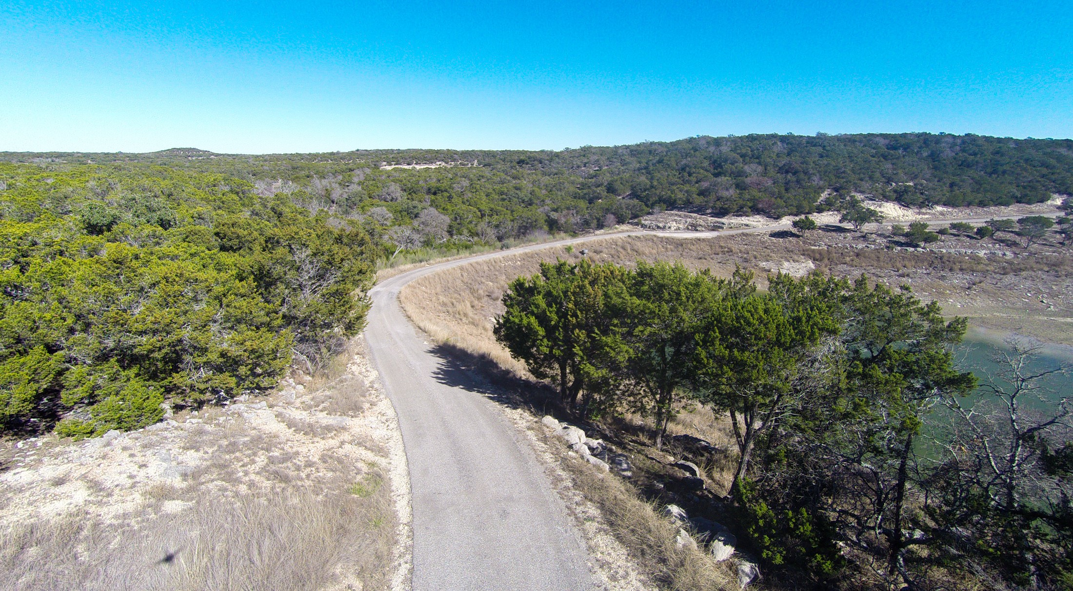 3777 Middle Creek Road Blanco, TX 78606 - Photo 8 of 40 a view of a dry yard with green space