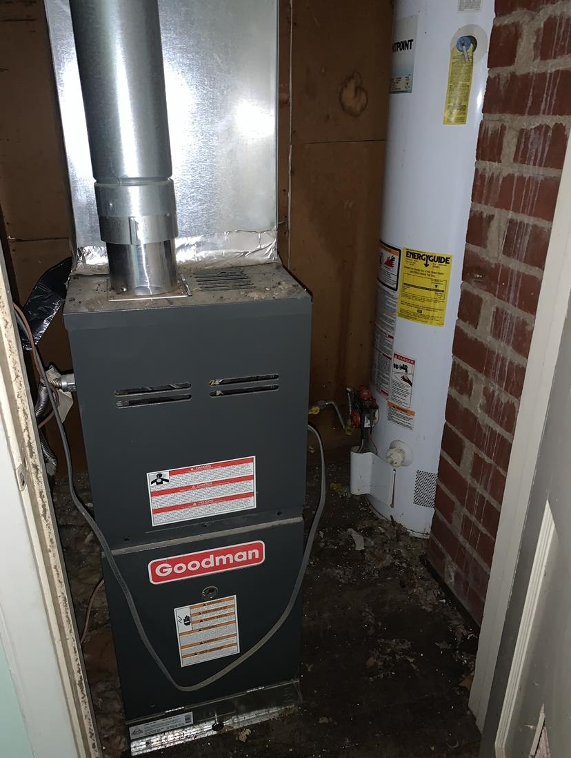 3741 Rhodes Avenue Memphis, TN 38111 - Photo 4 of 5 Utility room featuring heating utilities and water heater