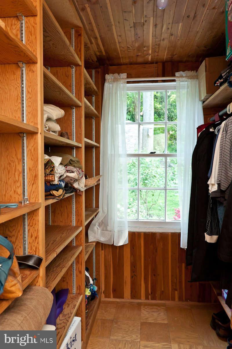 2510 Pickwick Road Baltimore, MD 21207 - Photo 18 of 30 a view of walk in closet with clothes and shoes