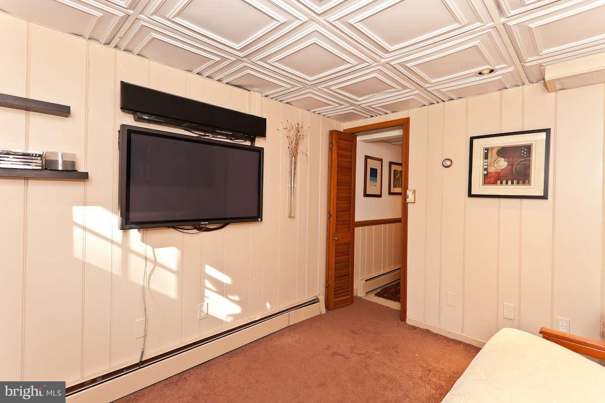 2510 Pickwick Road Baltimore, MD 21207 - Photo 22 of 30 a view of an empty room with wooden floor