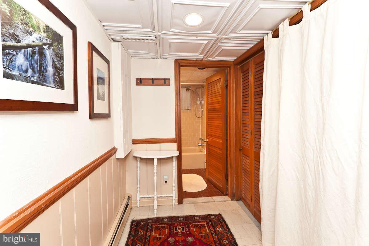 2510 Pickwick Road Baltimore, MD 21207 - Photo 23 of 30 a view of entryway and hall with wooden floor