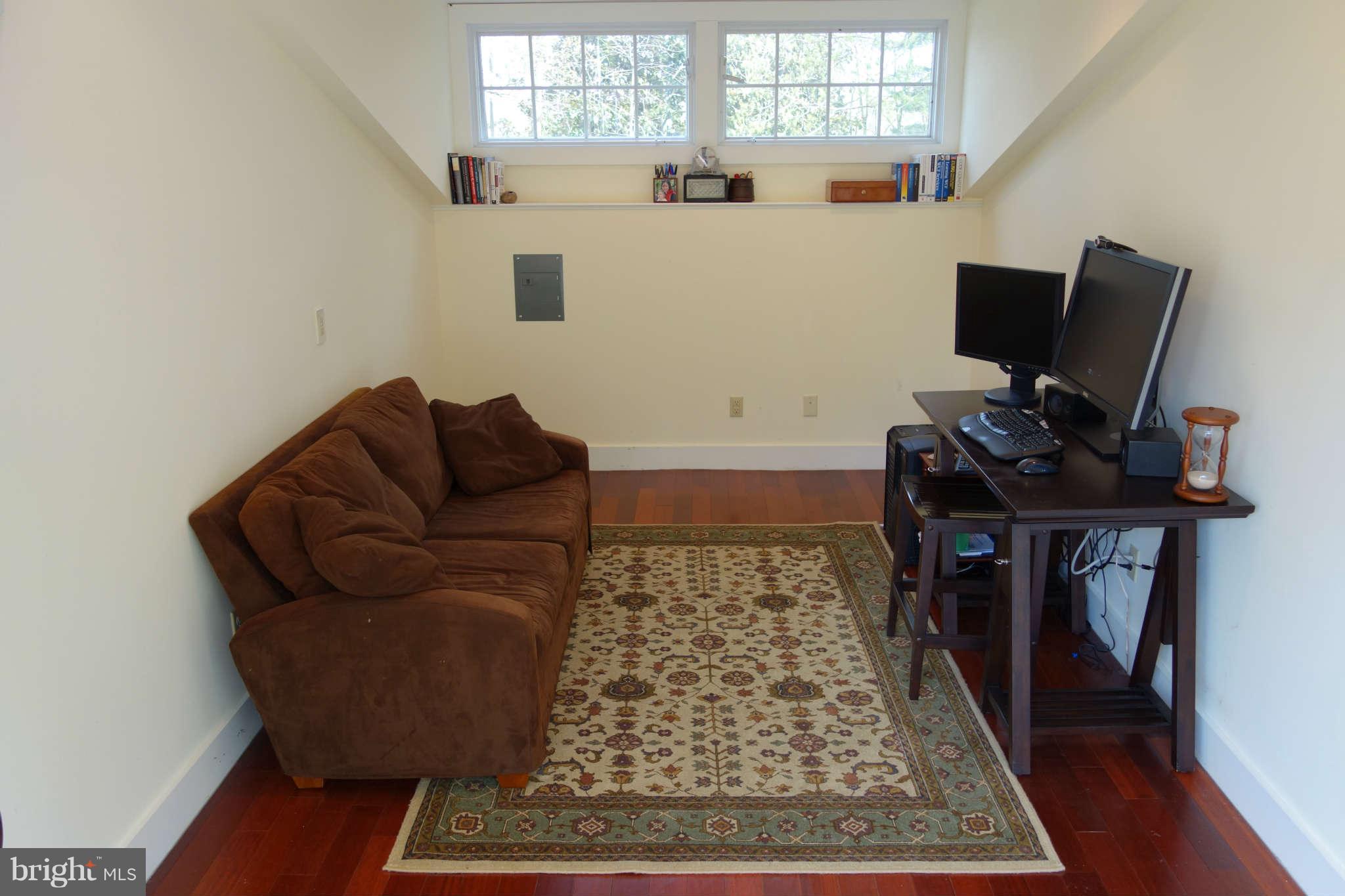 2510 Pickwick Road Baltimore, MD 21207 - Photo 26 of 30 a living room with furniture and a rug