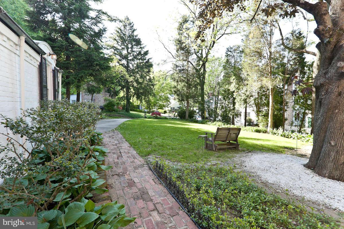2510 Pickwick Road Baltimore, MD 21207 - Photo 29 of 30 a view of a bench in a garden