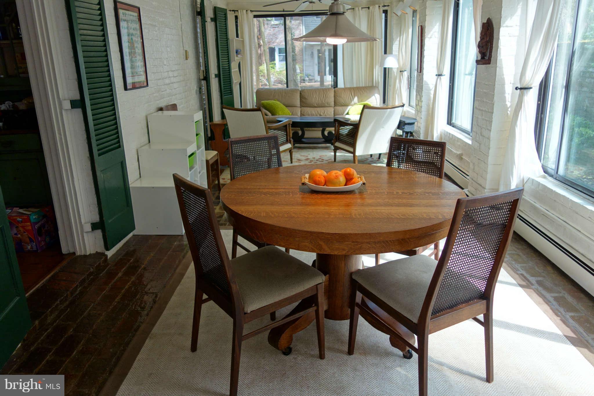 2510 Pickwick Road Baltimore, MD 21207 - Photo 7 of 30 a view of a dining room with furniture and wooden floor