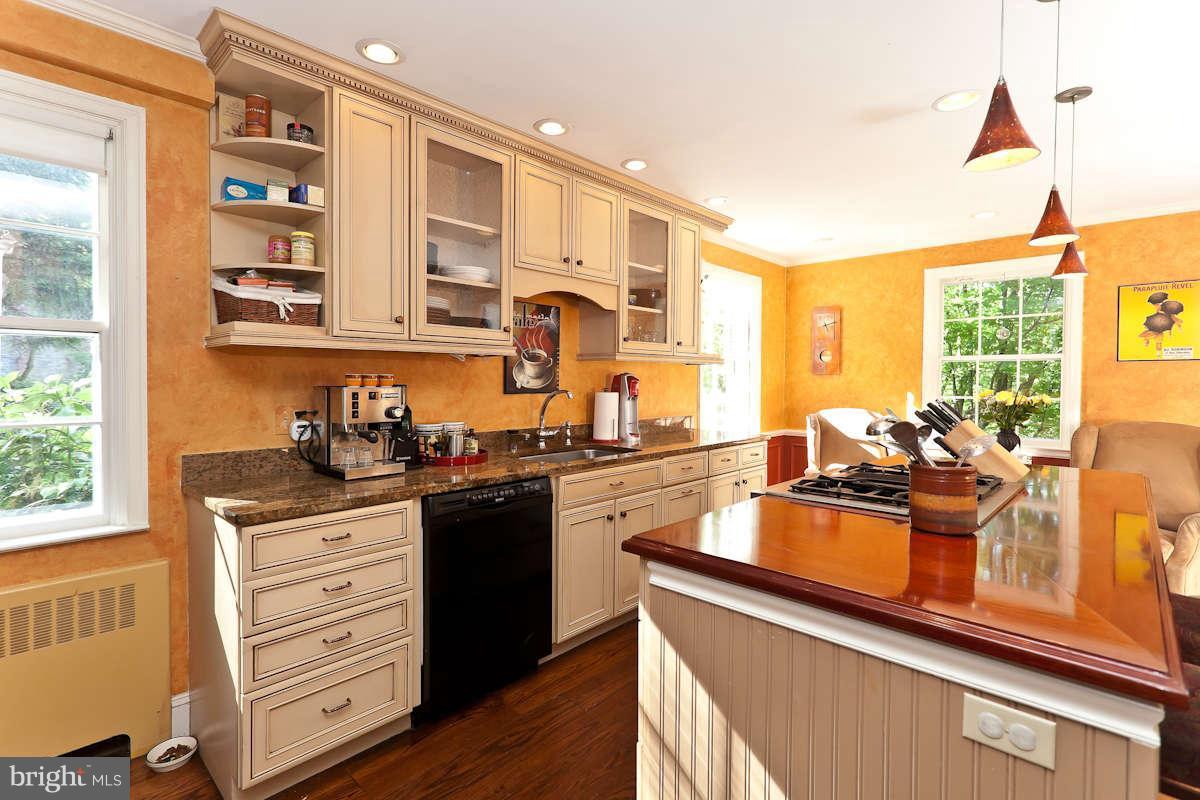 2510 Pickwick Road Baltimore, MD 21207 - Photo 10 of 30 a kitchen with stainless steel appliances granite countertop a stove and a sink