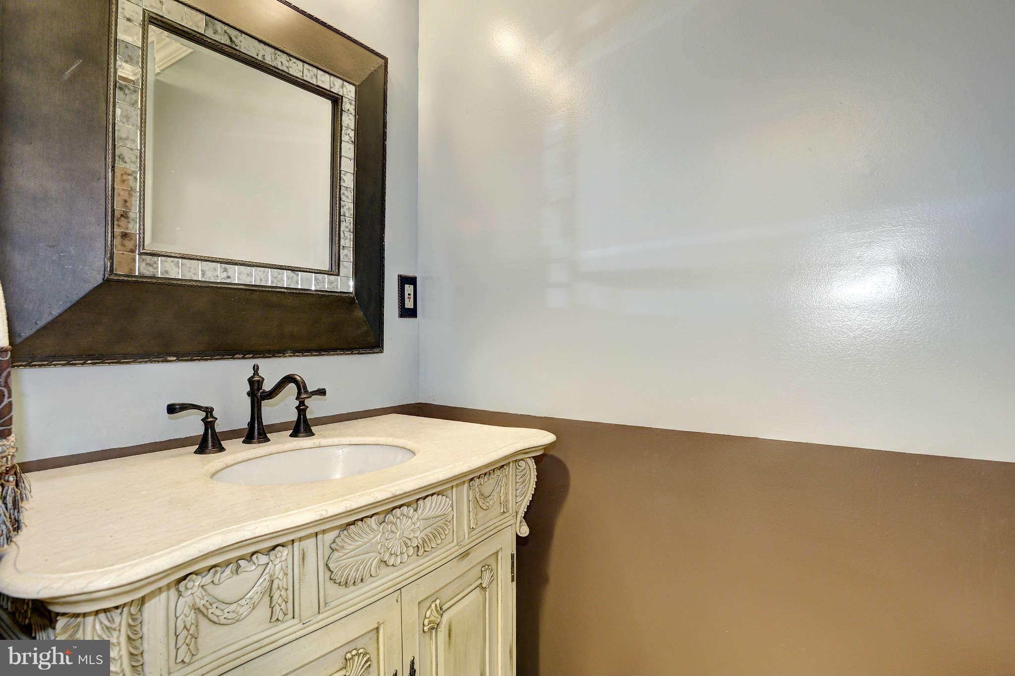 7014 Queen Anne Road Baltimore, MD 21207 - Photo 15 of 27 Powder Room