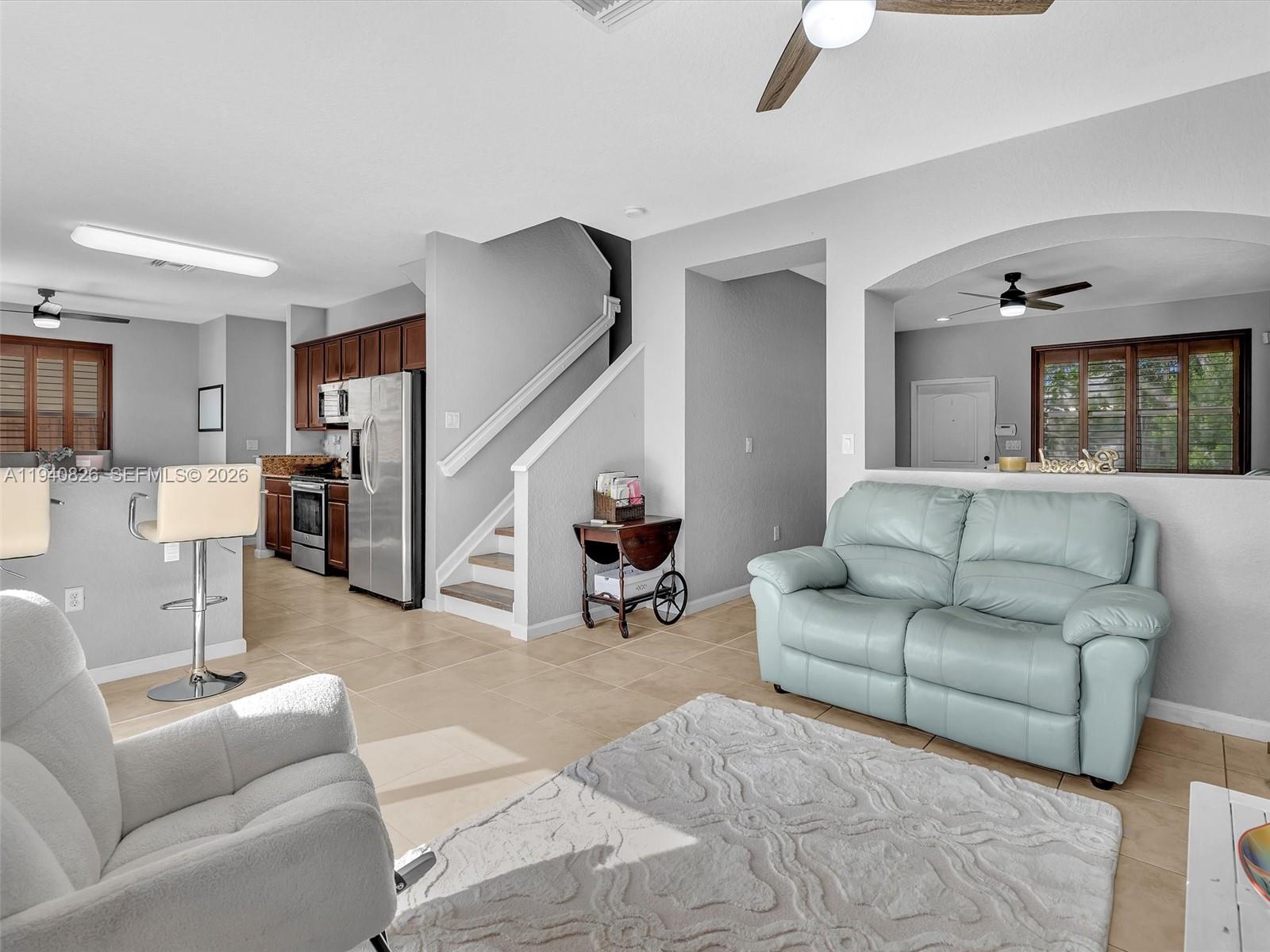 625 Southeast 30th Terrace Homestead, FL 33033 - Photo 12 of 71 a living room with furniture and a flat screen tv