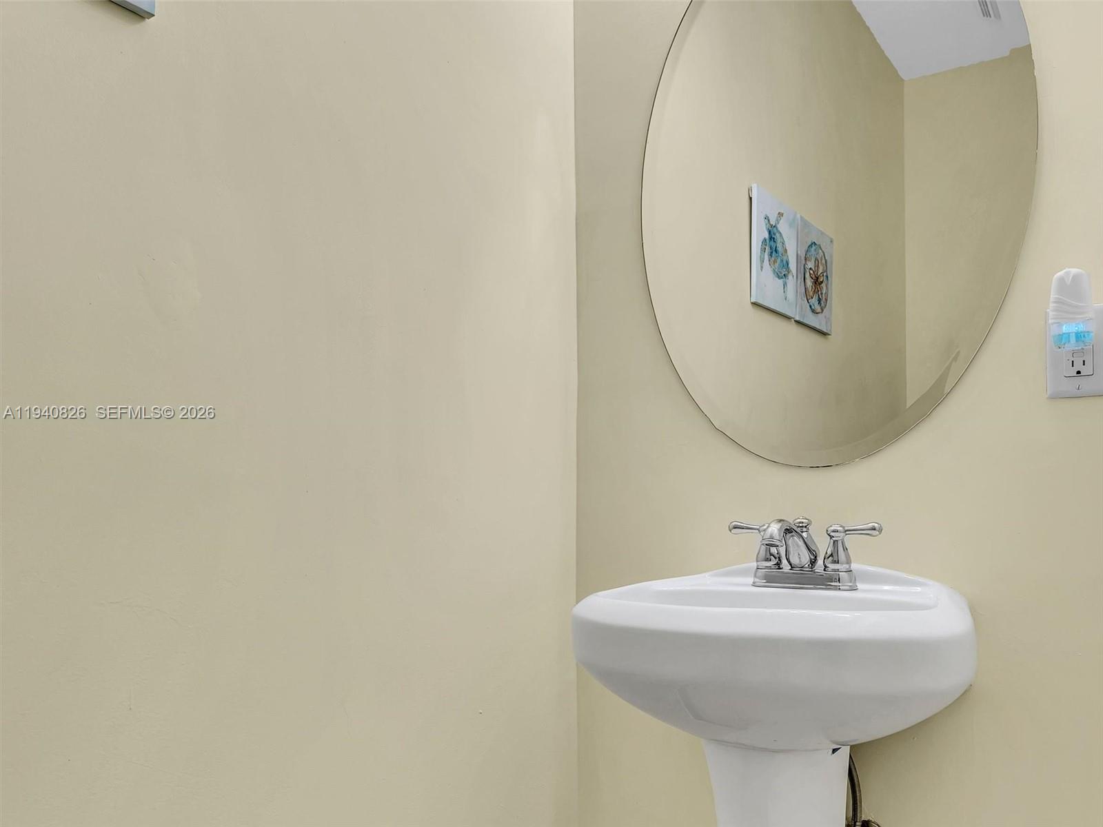 625 Southeast 30th Terrace Homestead, FL 33033 - Photo 21 of 71 a bathroom with a sink and a mirror