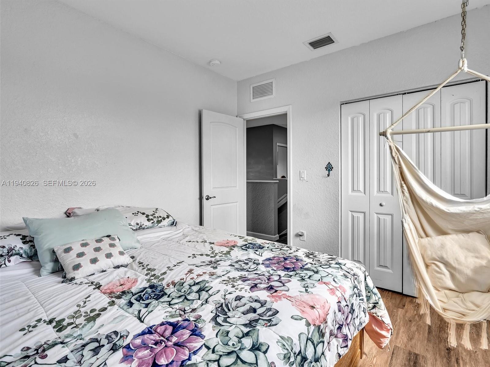 625 Southeast 30th Terrace Homestead, FL 33033 - Photo 26 of 71 a bedroom with a bed and walk in closet