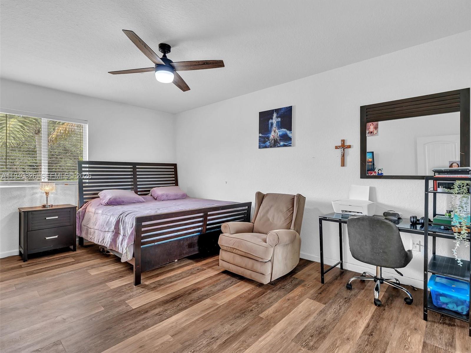 625 Southeast 30th Terrace Homestead, FL 33033 - Photo 31 of 71 a bedroom with a bed furniture and window