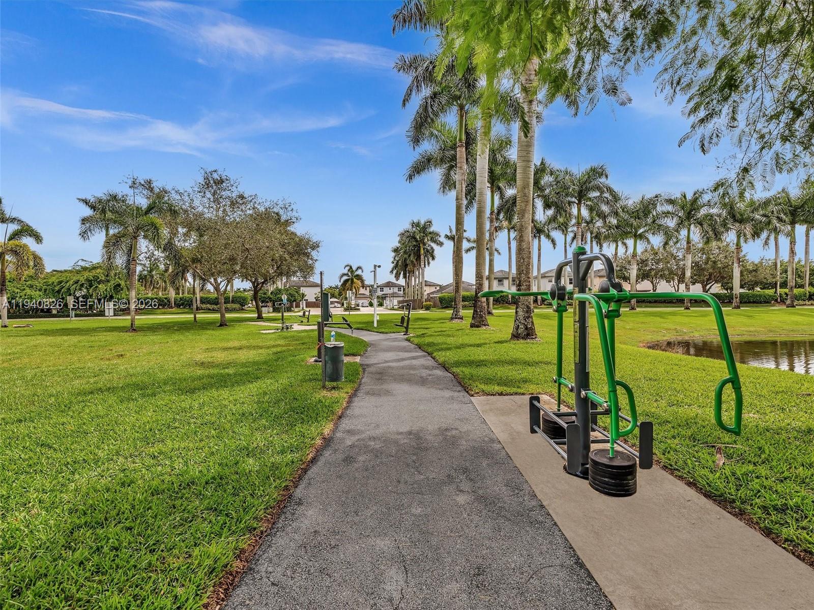 625 Southeast 30th Terrace Homestead, FL 33033 - Photo 43 of 71 a view of a park with swings and slides