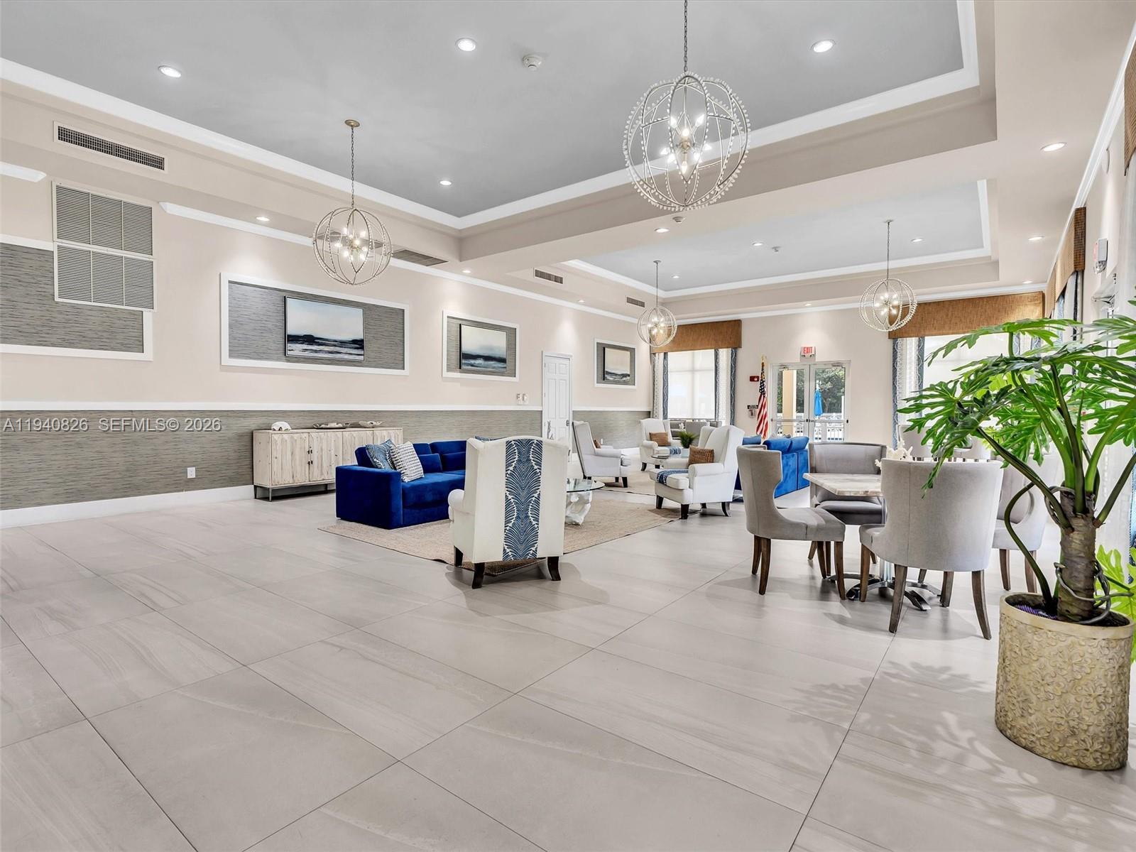 625 Southeast 30th Terrace Homestead, FL 33033 - Photo 48 of 71 a living room with furniture and a chandelier