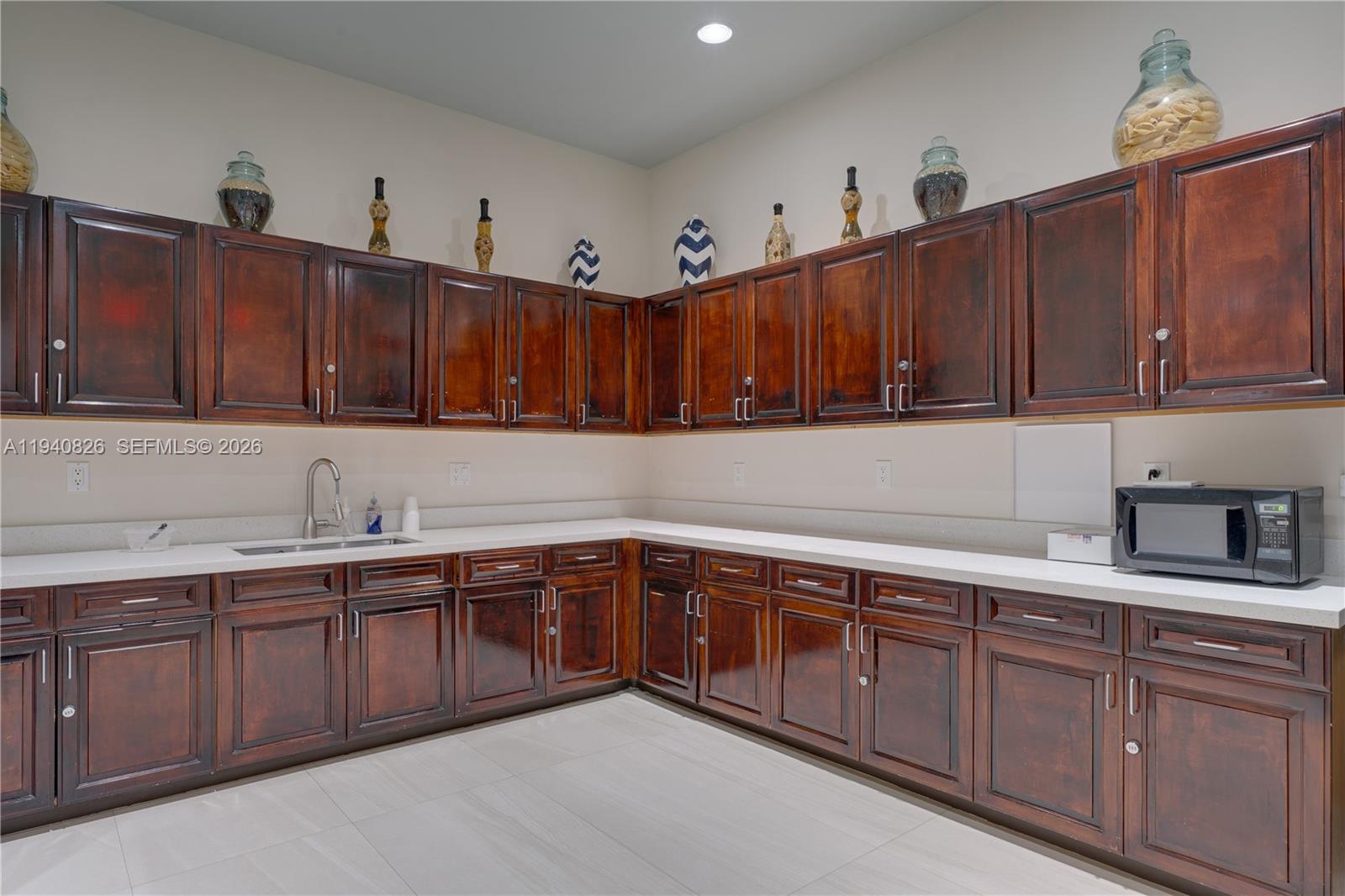 625 Southeast 30th Terrace Homestead, FL 33033 - Photo 49 of 71 a kitchen with a sink and cabinets
