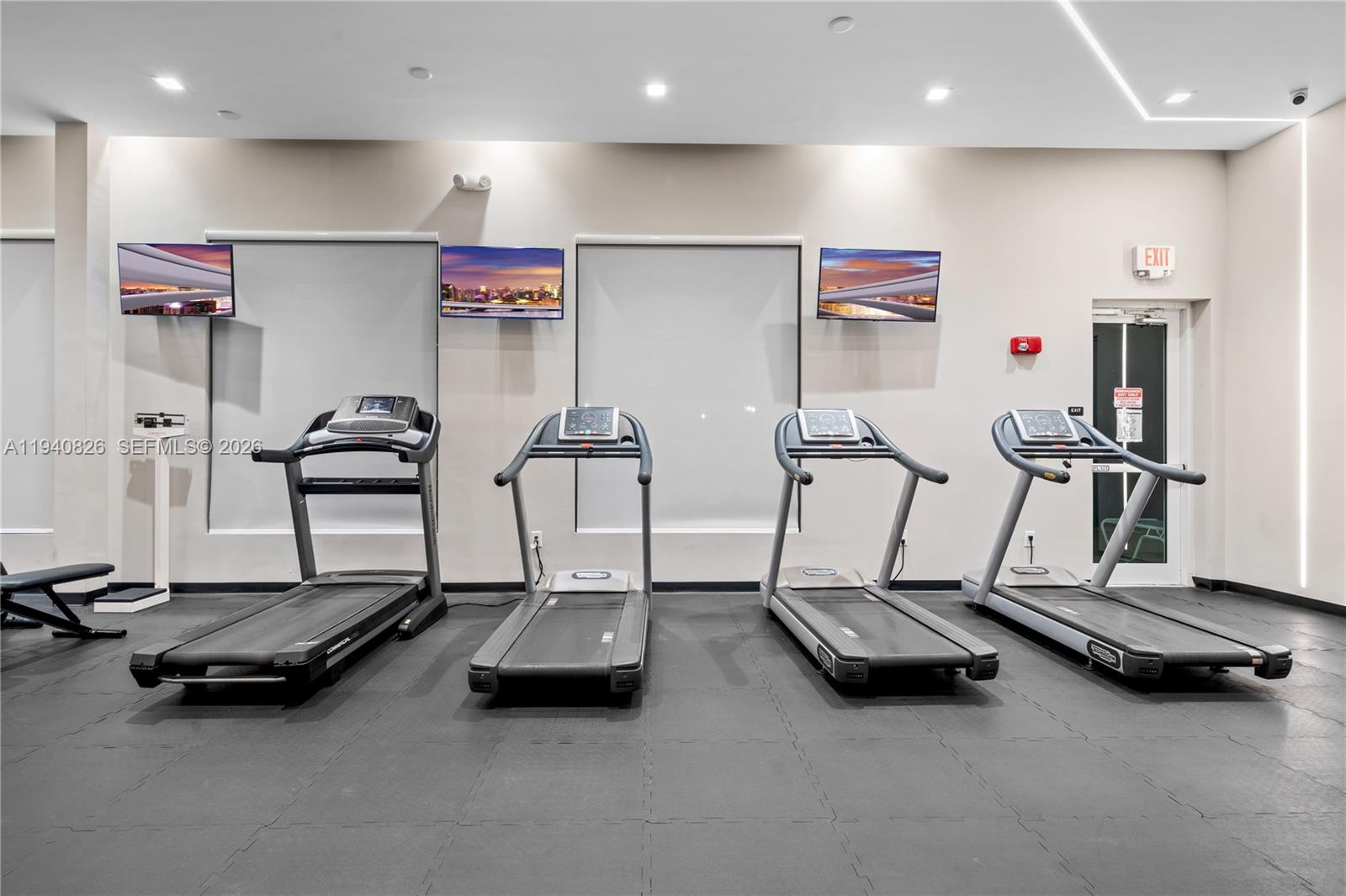 625 Southeast 30th Terrace Homestead, FL 33033 - Photo 54 of 71 a room with gym equipment and white walls