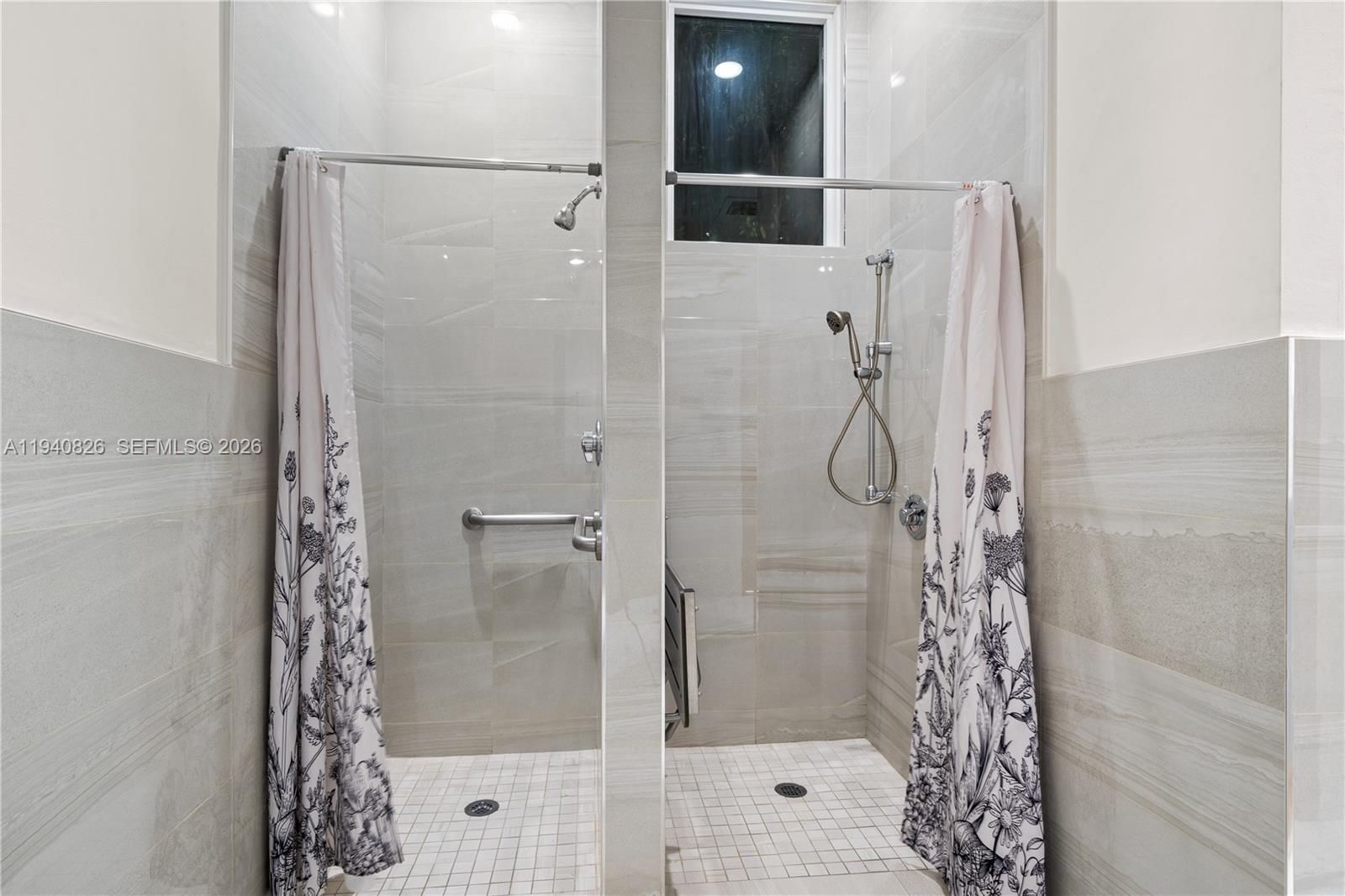 625 Southeast 30th Terrace Homestead, FL 33033 - Photo 56 of 71 a bathroom with a shower and a mirror