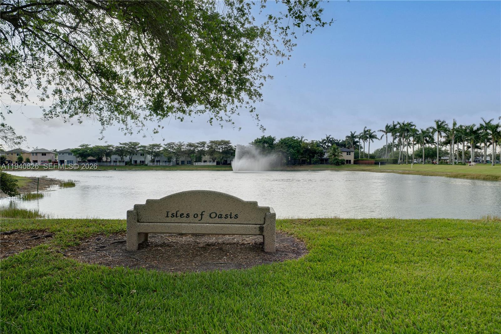 625 Southeast 30th Terrace Homestead, FL 33033 - Photo 66 of 71 a view of a lake with houses in the back