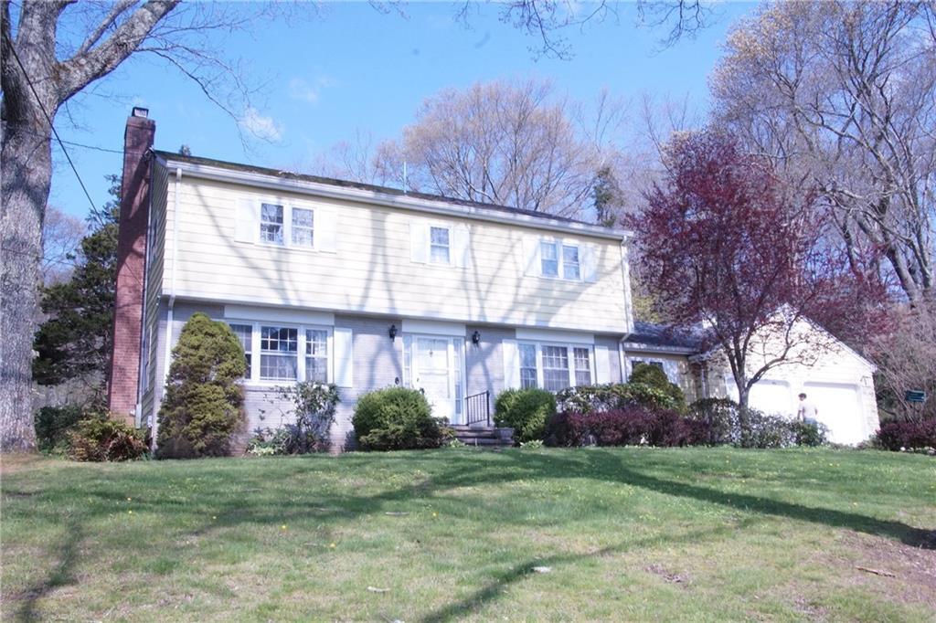 32 Ridge Drive North Old Saybrook, CT 06475 - Photo 1 of 1 a front view of a house with garden