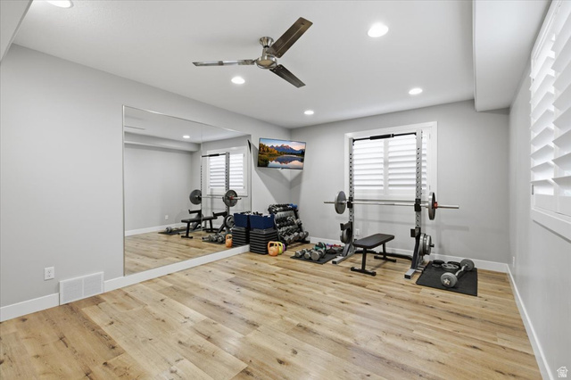 21 Pier Place Tooele, UT 84074 - Photo 73 of 112 Spacious room featuring wood-finish flooring, a full-wall mirror, and recessed lighting