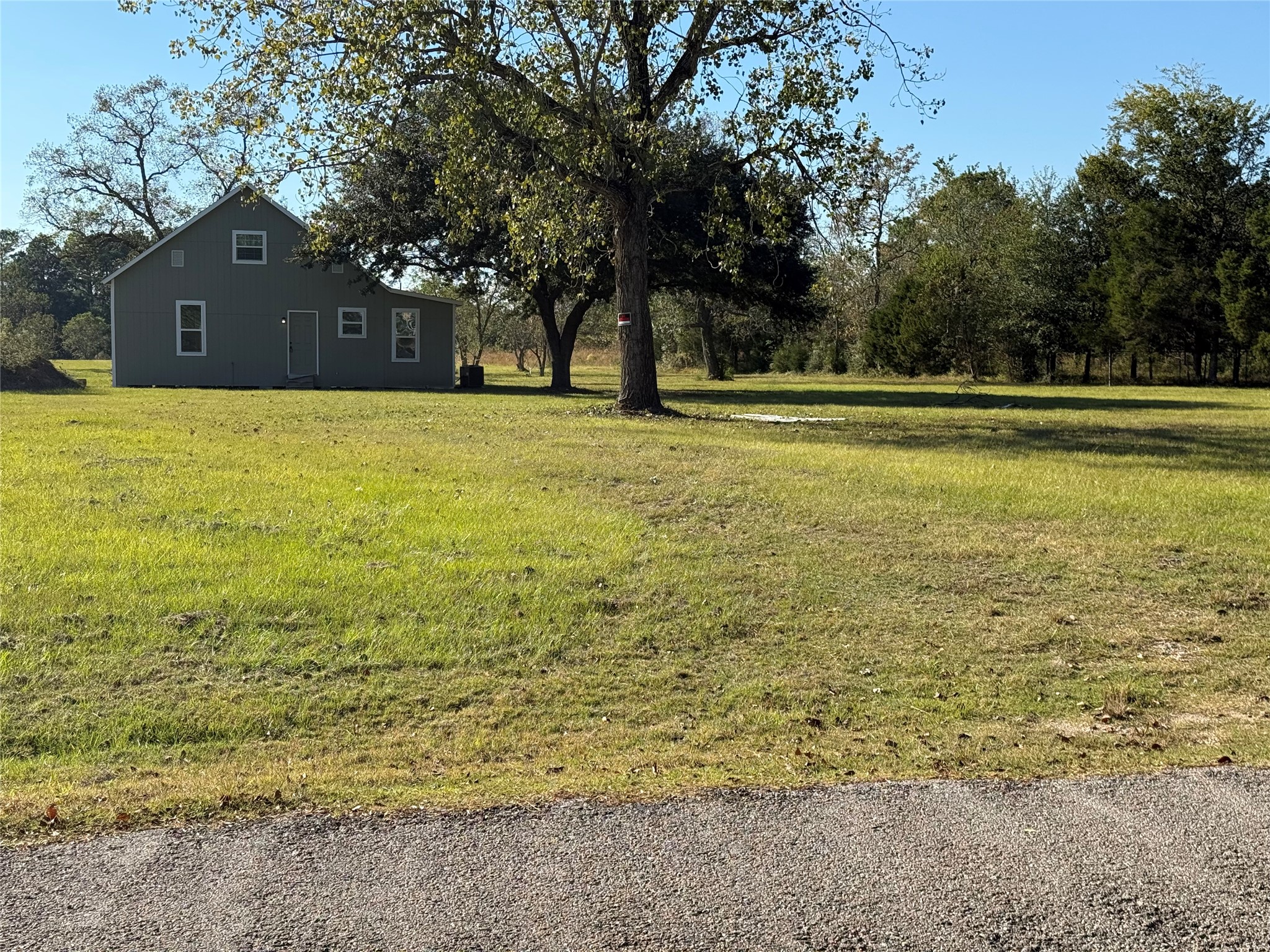 10534 Hufsmith Road Tomball, TX 77375 - Photo 8 of 34 a view of swimming pool with a yard
