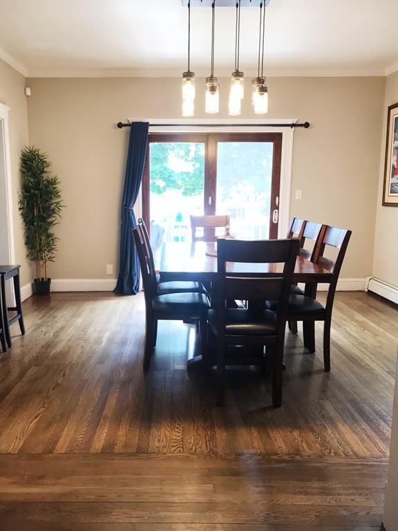 15 Fair Street Hull, MA 02045 - Photo 3 of 8 a view of a dining room with furniture window and wooden floor