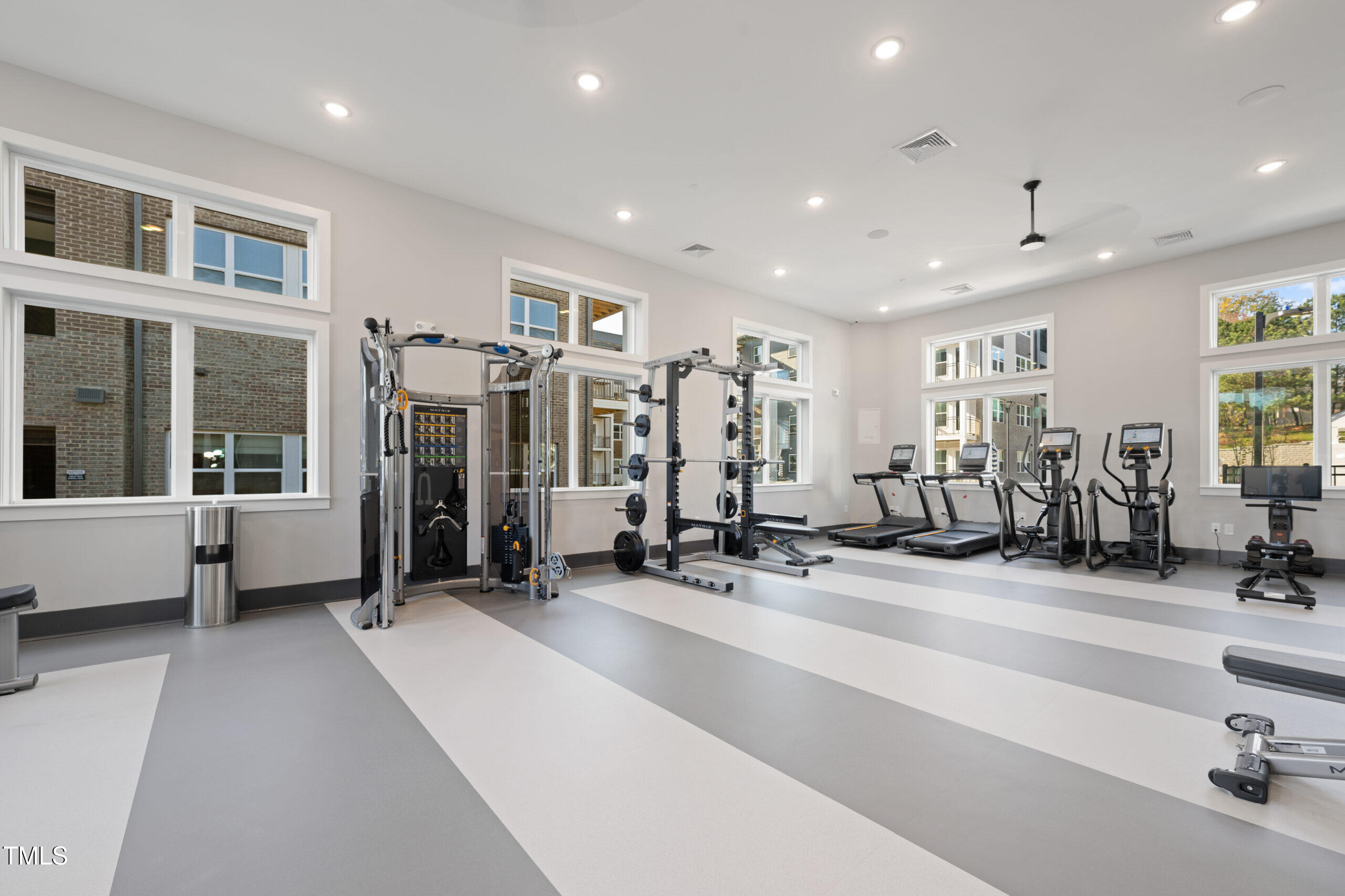 211 Hammond Center Drive, Unit A1 Raleigh, NC 27603 - Photo 4 of 30 a view of a room with gym equipment