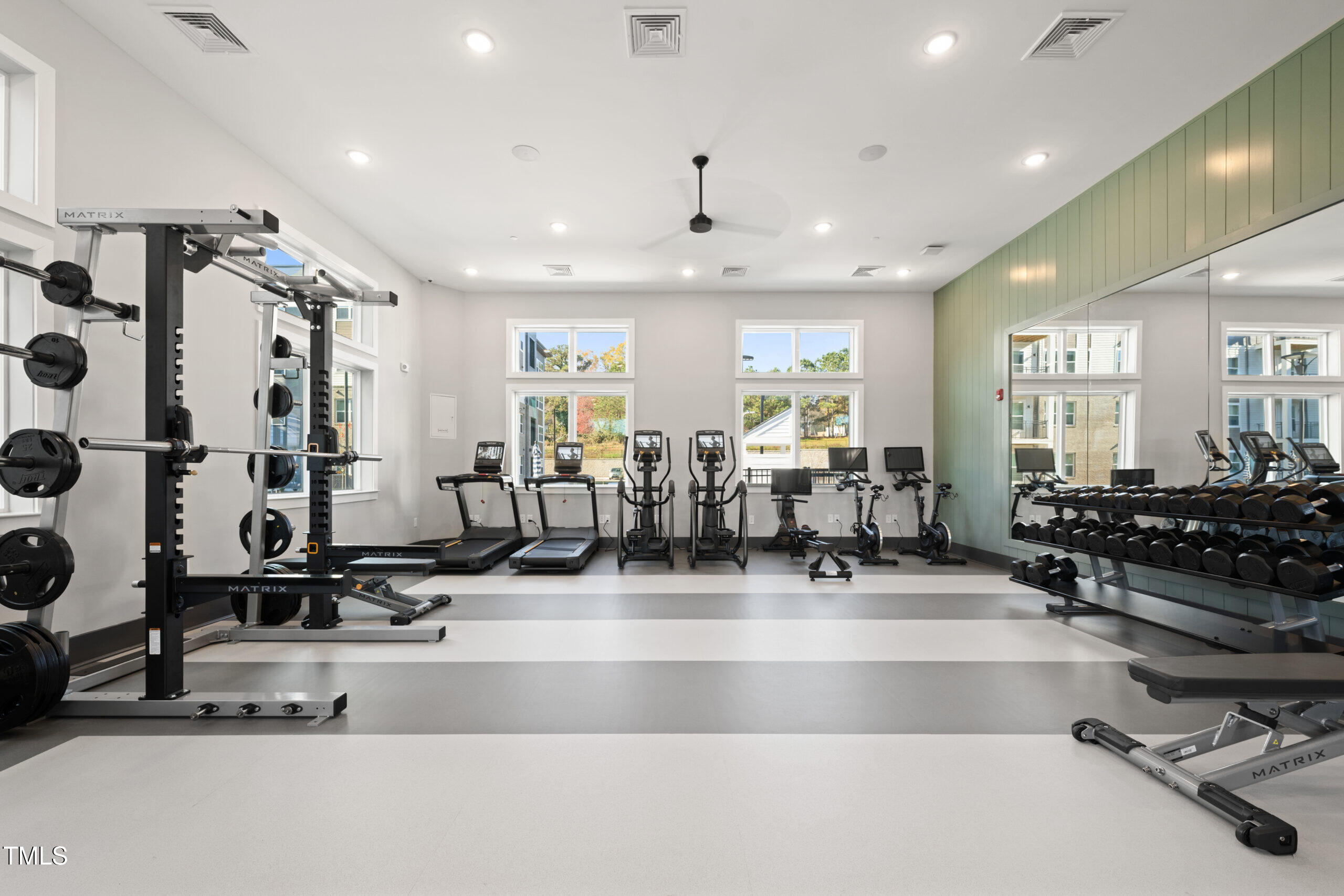 211 Hammond Center Drive, Unit A1 Raleigh, NC 27603 - Photo 6 of 30 a view of a room with gym equipment