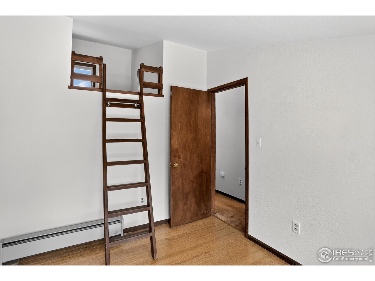 192 Nugget Hill Road Jamestown, CO 80455 - Photo 21 of 25 Ladder leading to a nook in the 2nd upstairs bedroom