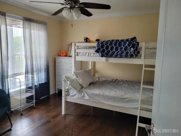a bed room with a bed and a window