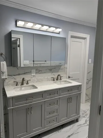 a white toilet sitting next to a window